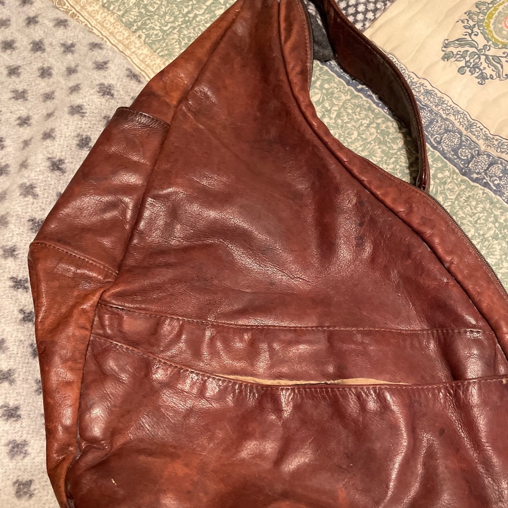 Norm Thompson back saver leather purse